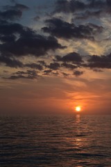 Beautiful orange sunset over the water