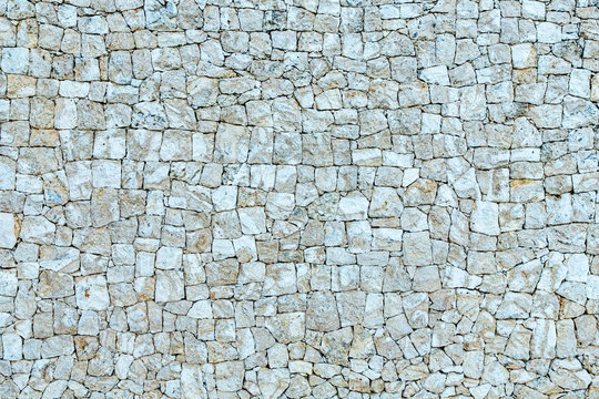 White, beige, gray stone texture wall, bricks, caliche template, background with copy space