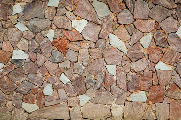 Red, ginger, beige and brown stone texture wall, bricks, template, background with copy space