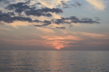 Fototapeta na wymiar Pink and blue sunset over sea