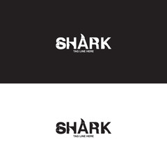 Shark logo with fin on black and white background
