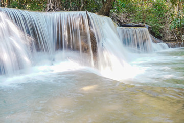 Obraz premium waterfall in rainforest at National Park, Thailand