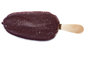 Popsicle ice cream on a stick, covered with chocolate icing, isolated on a white background