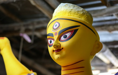 Goddess Durga idol in unfinished state for Durga Puja festival at Kolkata, West Bengal, India
