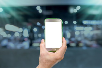 hand holding mobile smart phone with restaurant blur background,vintage effect style