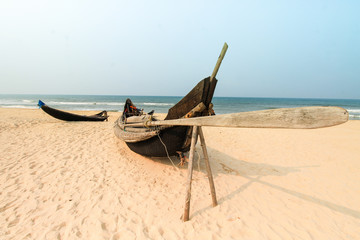 Traditional wooden Vietnamese boat at a beach in Hue, Vietnam