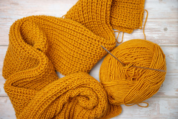 yellow knitting on the table