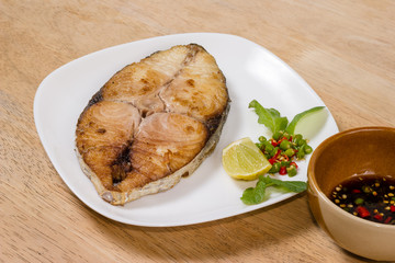 spanish mackerel steak on wood background,fried fish