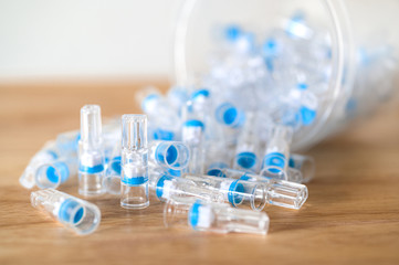 Cigarette holder filter reduce tar on wood desk.