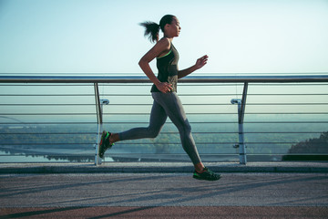 Keeping fit while running outdoors stock photo