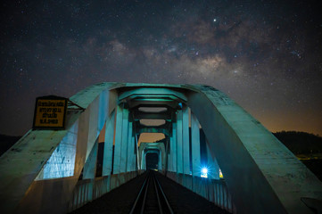 milky way over the bridge of train light