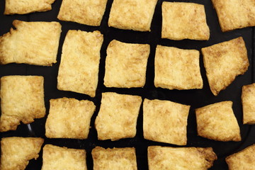 Freshly baked cookies in baking tray