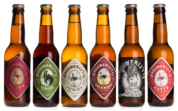 GRONINGEN, NETHERLANDS - DECEMBER 19, 2017: Collection of Dutch craft beers bij brewery Brouwerij t IJ, isolated on a white background