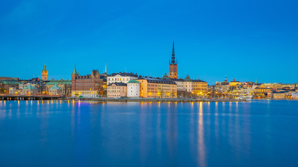 Naklejka premium Stockholm city skyline with view of Gamla Stan at night in Stockholm, Sweden