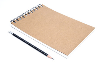 closeup close note book with pencil on background