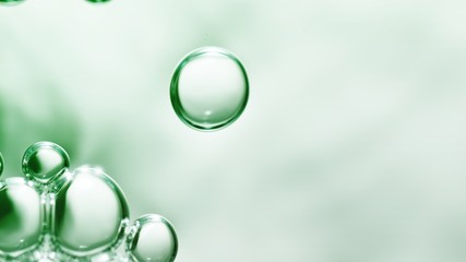 transparent gas bubbles on water surface. Worms-eye low angle with crystal bubbles in purified water on green background. cosmetic backdrop with copy space