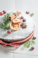 Fototapeta na wymiar Poppy seed cake for Christmas made with cocoa