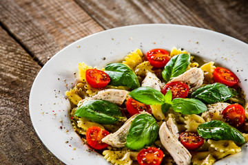 Tagliatelle with boiled chicken breast and pesto