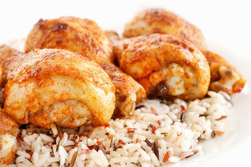 Indian cuisine: roasted chicken with rice and vegetables.