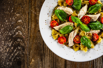 Tagliatelle with boiled chicken breast and pesto