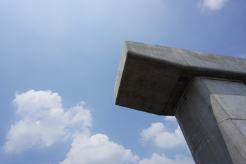 A concrete pier of the skytrain under blue sky