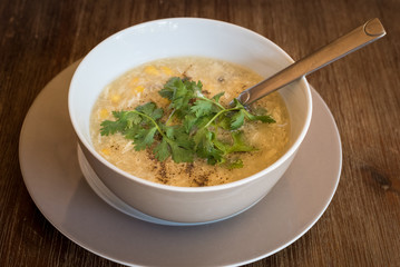 Asian crab meat soup with chicken, egg and corn.
