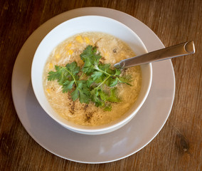 Asian crab meat soup with chicken, egg and corn.