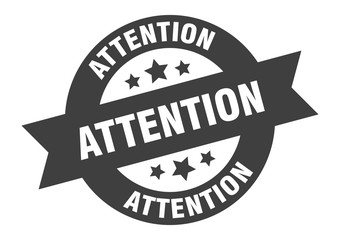 attention sign. attention black round ribbon sticker