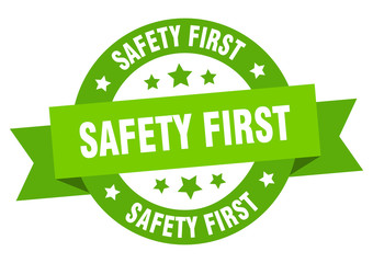 safety first ribbon. safety first round green sign. safety first