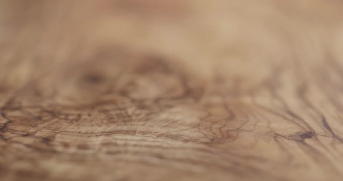 Focus pull of oil finished olive wood surface