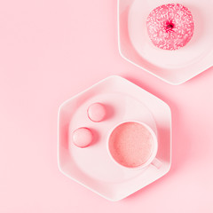 Breakfast with coffee on a pastel pink background