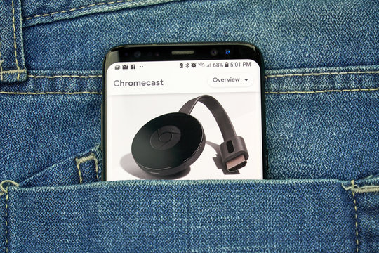Google Chromecast logo on a phone screen in a pocket