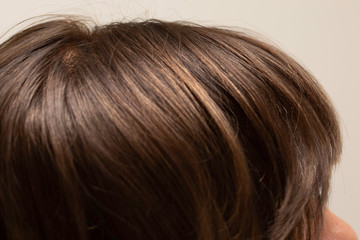 Brown female hair close up