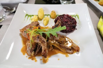 grilled beef steak with sauce and vegetables
