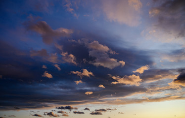 Fototapeta na wymiar Dramatic sky with orange clouds. Nature background.