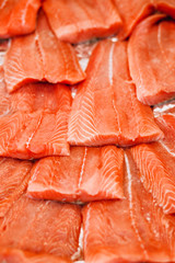 Closeup fresh salmon filet - red fish - fruit rural market