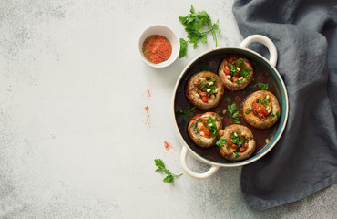 Mushrooms stuffed with mince and tomatoes