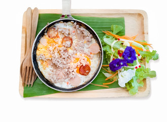 eggs pan with topping on white background for breakfast menu.