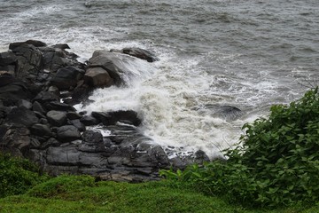 waves crashing on rocks