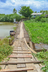 Suphanburi province Thailand, view of typical wooden bridge. river of South East Asia.