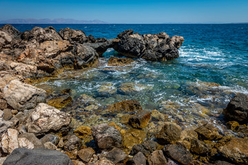 Fototapeta na wymiar Rocky coastline of Kos Greece Limnionas