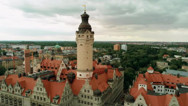 Aerial View of New Town Hall - Neues Rathaus - Monumental Building in style of German Late Renaissance in Leipzig's Old Town, Germany, Europe. 4K Background Amazing Drone Skyfall Reveal Shot