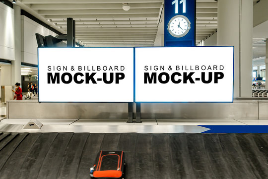 Mock up large blank horizontal billboard at baggage claim point
