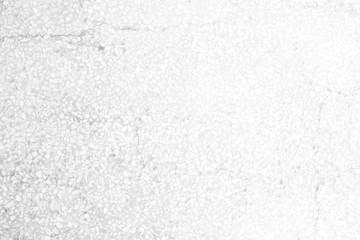 White Glitter Sand Wall Texture Background with Light Leak from the Right.