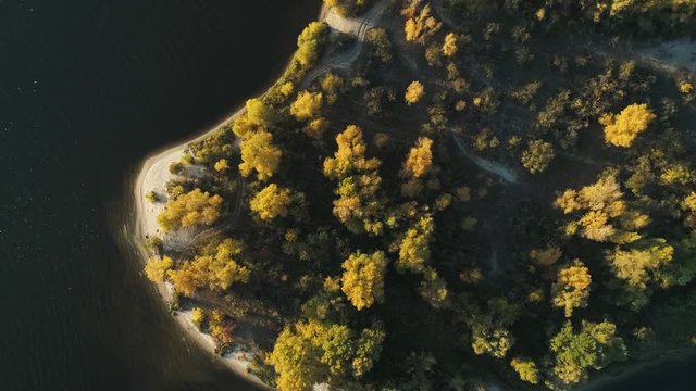 Aerial drone footage. Top down view rotate autumn island