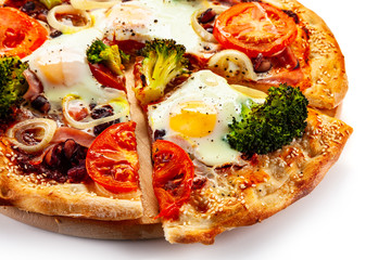 Vegetarian pizza with eggs, broccoli and onion