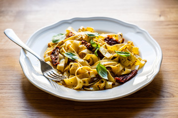 Pasta with sauce and sun-dried tomatoes