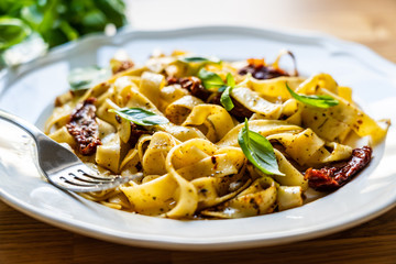 Pasta with sauce and sun-dried tomatoes
