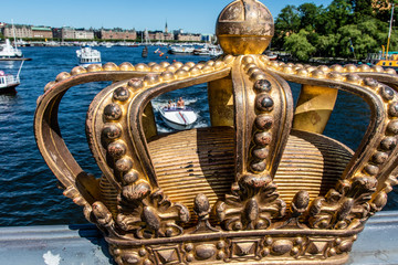 Gilded crown on the Skeppsholmsbron bridge in Stockholm, Sweden, Europe