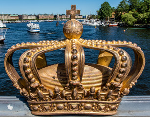 Gilded crown on the Skeppsholmsbron bridge in Stockholm, Sweden, Europe
